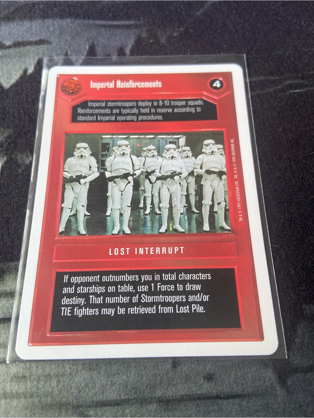 Imperial Reinforcements, a red Lost Interrupt card from the 1995 Star Wars